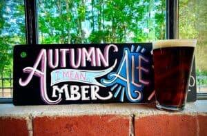 Image of a pint glass of Autumn, I Mean Amber Ale from Hoodletown Brewery